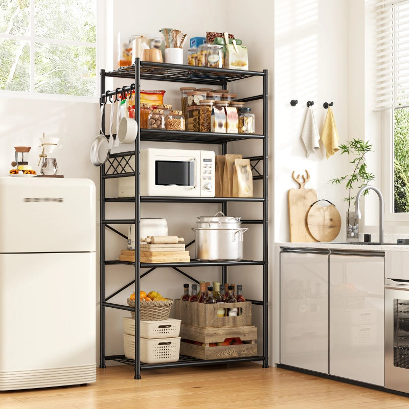 Black metal shelving unit in a kitchen with various items on shelves.